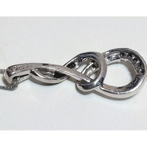 Infinity Swirl 925 Silver Pendant w. Black & White Diamond Chips with 17" chain - Picture 5 of 6